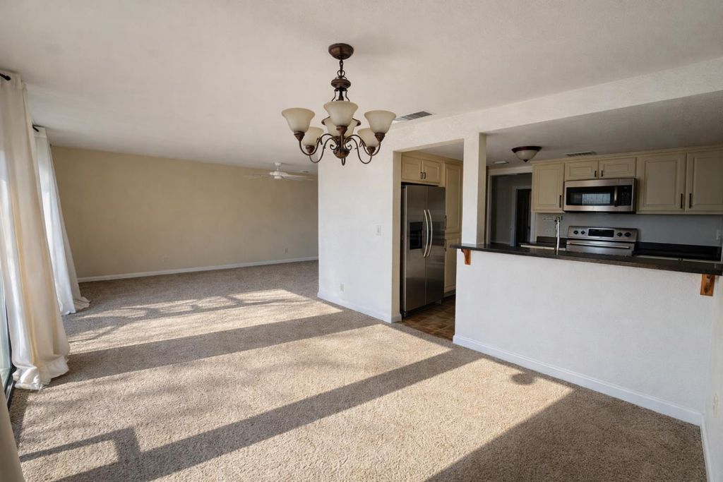 Photo of 903 Fulton Avenue #406, Sacramento, CA 95825 (MLS # 226005396)
