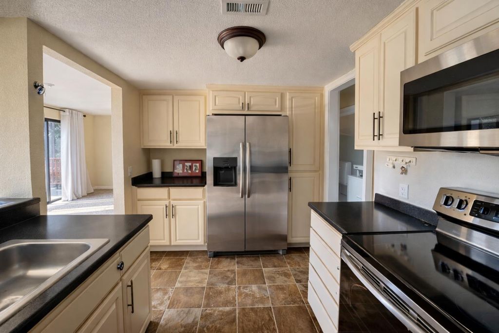 Photo of 903 Fulton Avenue #406, Sacramento, CA 95825 (MLS # 226005396)