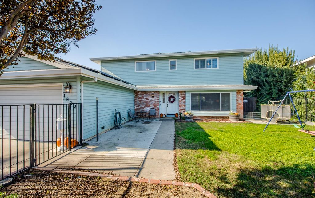 Photo of 1622 Carnelian Court, Woodland, CA 95695 (MLS # 225146573)