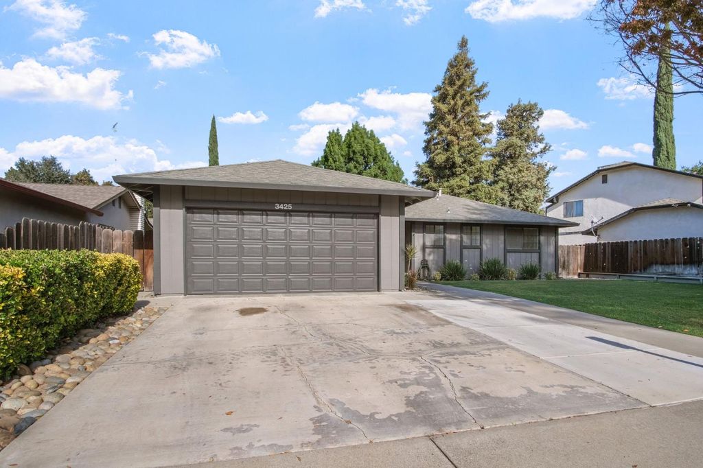 Photo of 3425 Woodbine Drive, Modesto, CA 95355 (MLS # 225143450)
