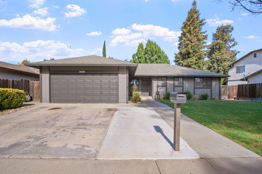 Photo of 3425 Woodbine Drive, Modesto, CA 95355 (MLS # 225143450)
