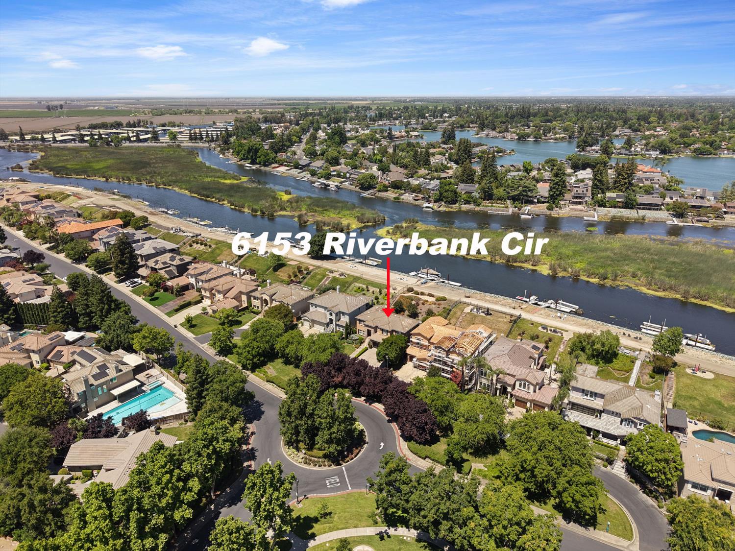 6153 Riverbank Circle