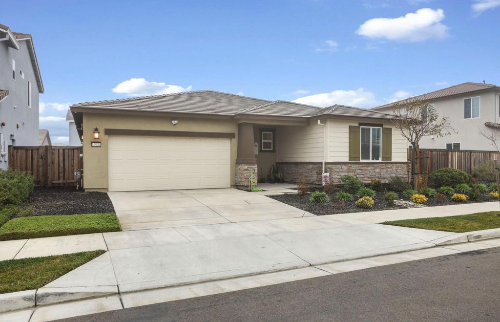Photo of 10024 Baltisan Lane, Stockton, CA 95219 (MLS # 226006200)