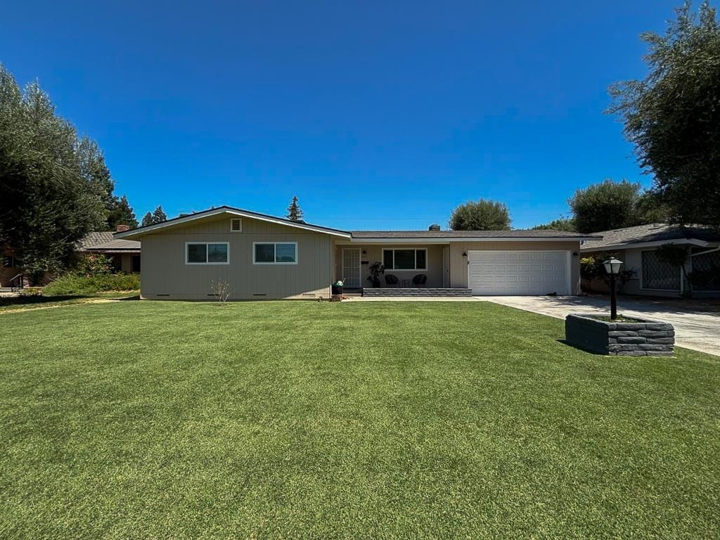 Photo of 1237 De Cesari Avenue, Madera, CA 93637 (MLS # 225134810)