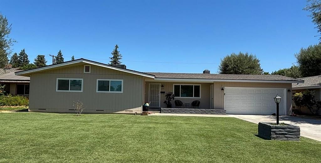 Photo of 1237 De Cesari Avenue, Madera, CA 93637 (MLS # 225134810)