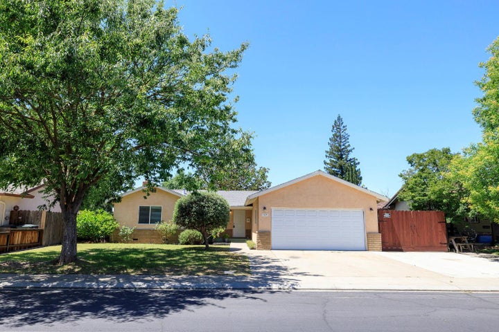 Nestled on pretty, quiet well maintained street this home is a real charmer!