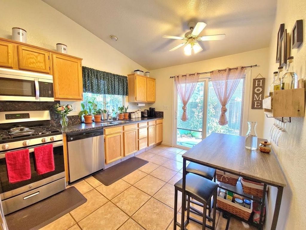 Photo of 8568 Derlin Way, Sacramento, CA 95823 (MLS # 226032741)