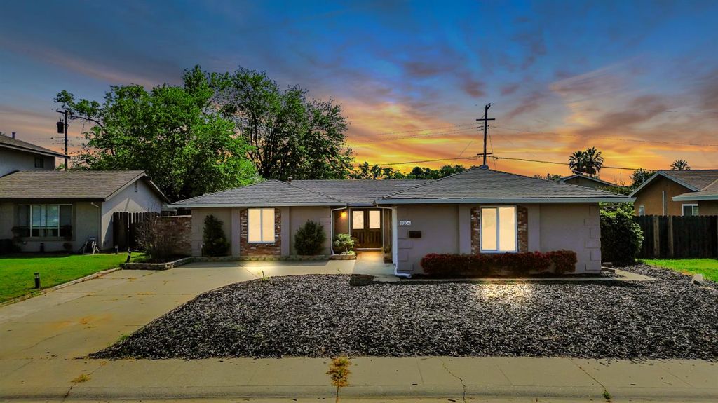 Photo of 9104 Feather River Way, Sacramento, CA 95826 (MLS # 226034865)