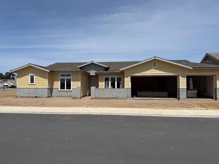 House has not been painted yet and stone will go in the gray areas