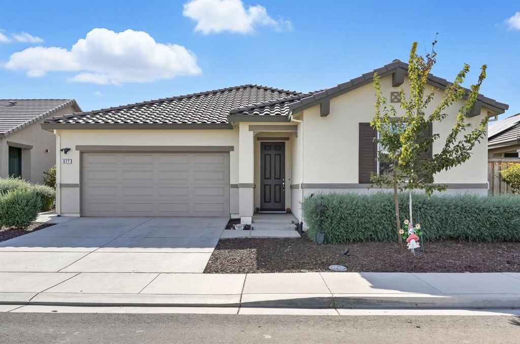 Photo of 617 Mansfield Drive, Patterson, CA 95363 (MLS # 225128758)