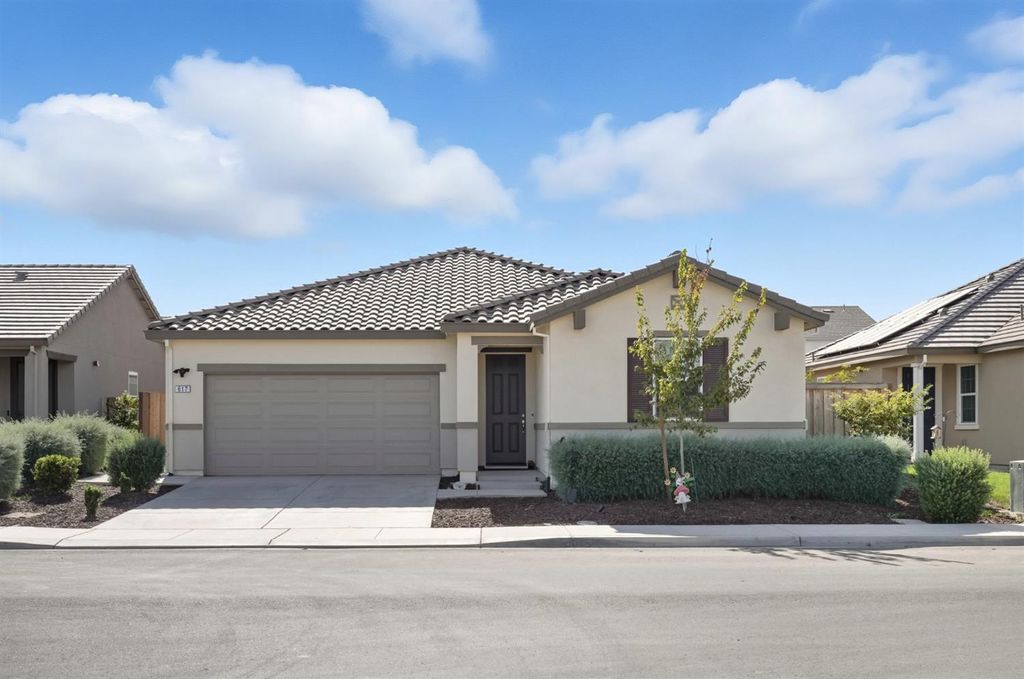 Photo of 617 Mansfield Drive, Patterson, CA 95363 (MLS # 225128758)
