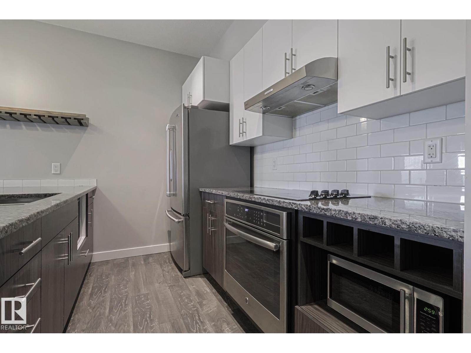 #404 10126 144 ST NW NW