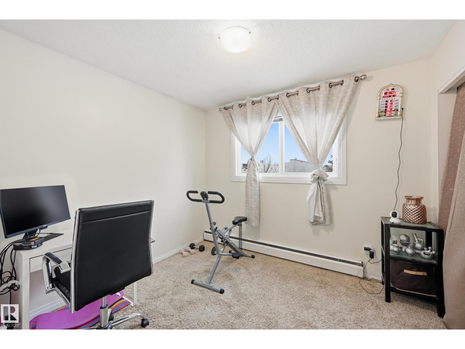 #306 10811 115 ST NW NW