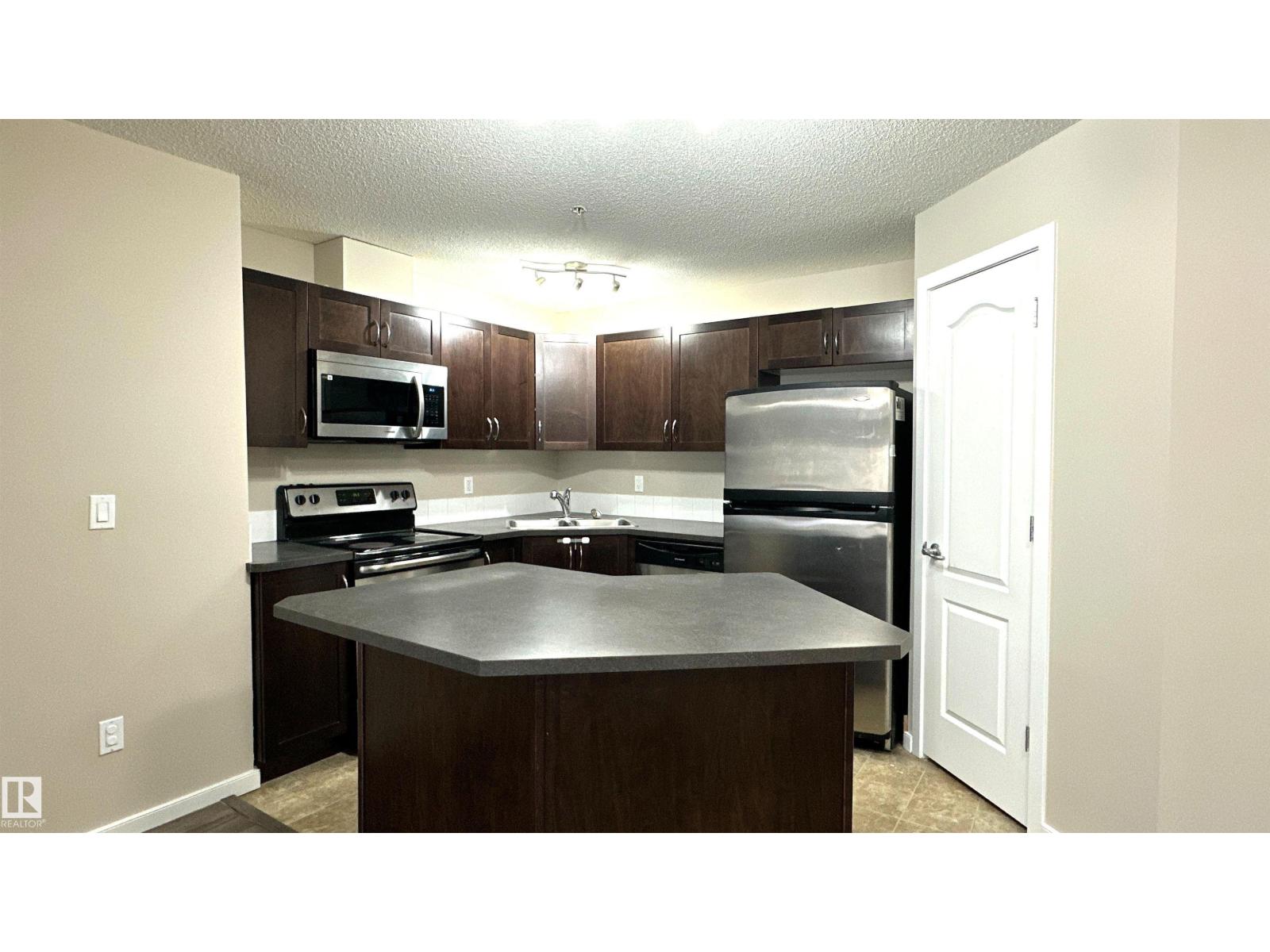 #111 392 SILVER BERRY RD NW