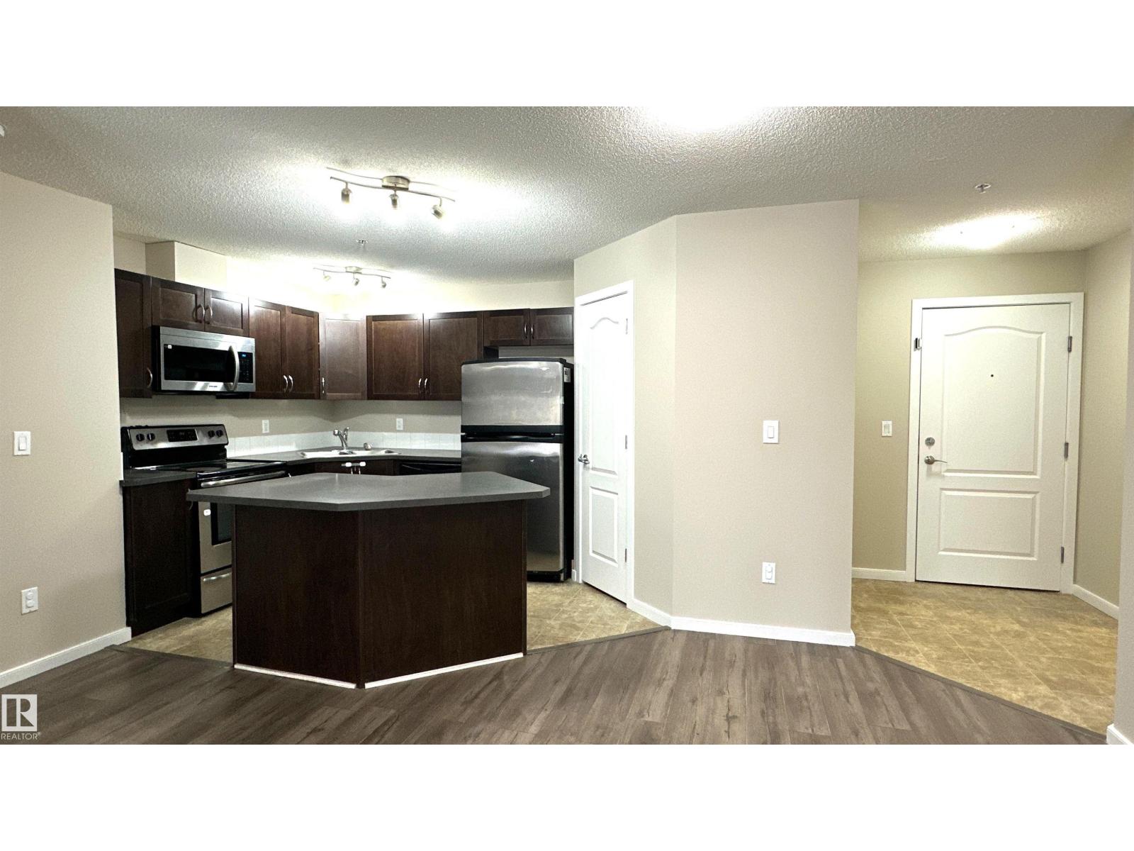 #111 392 SILVER BERRY RD NW