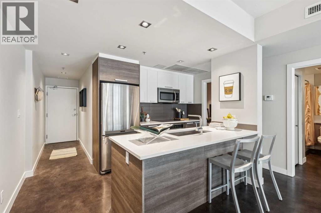 310, 235 9A Street NW