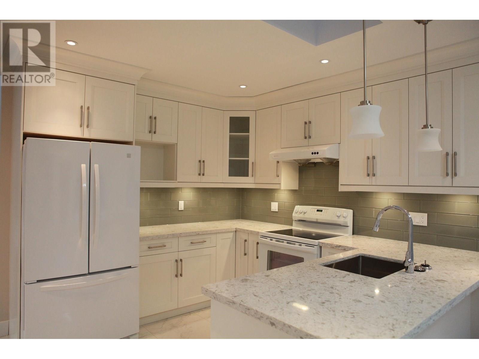 455 W 38TH AVENUE