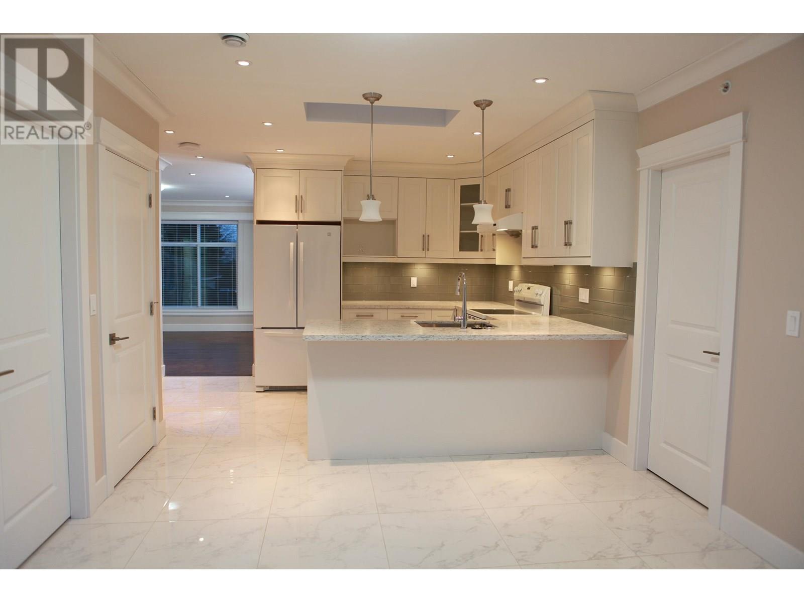 455 W 38TH AVENUE