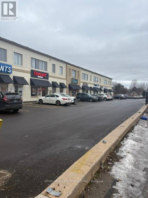 201-203 - 875 MAIN STREET E