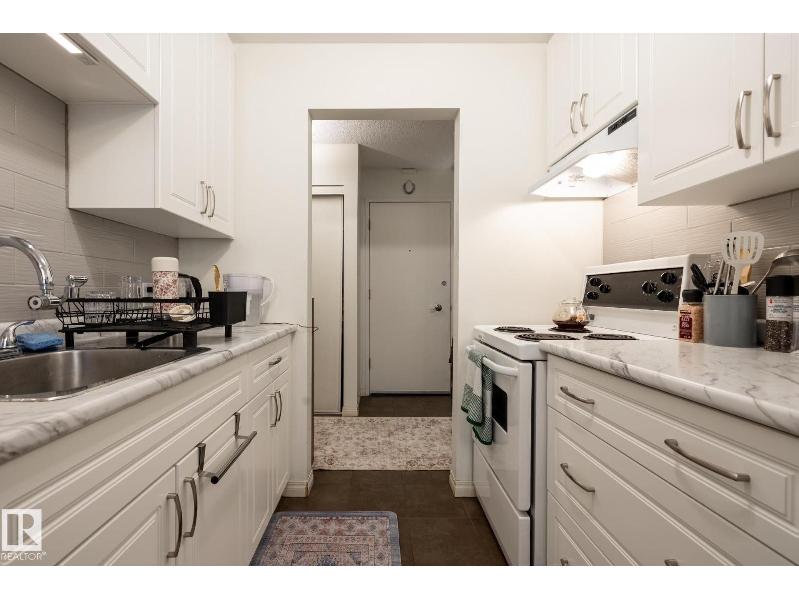 #307 5730 RIVERBEND RD NW