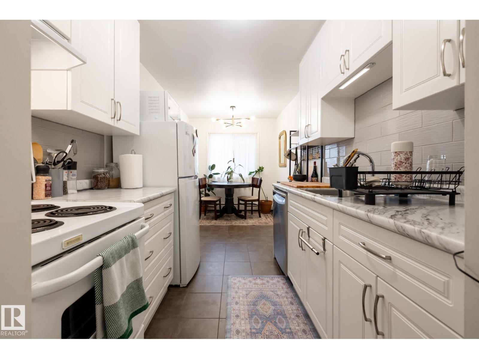 #307 5730 RIVERBEND RD NW