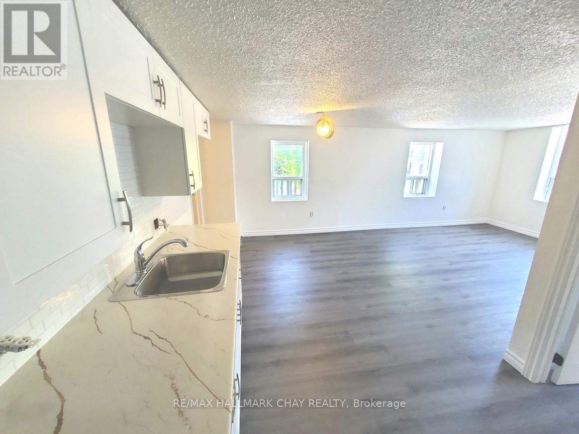 5 - 58 QUEEN STREET W