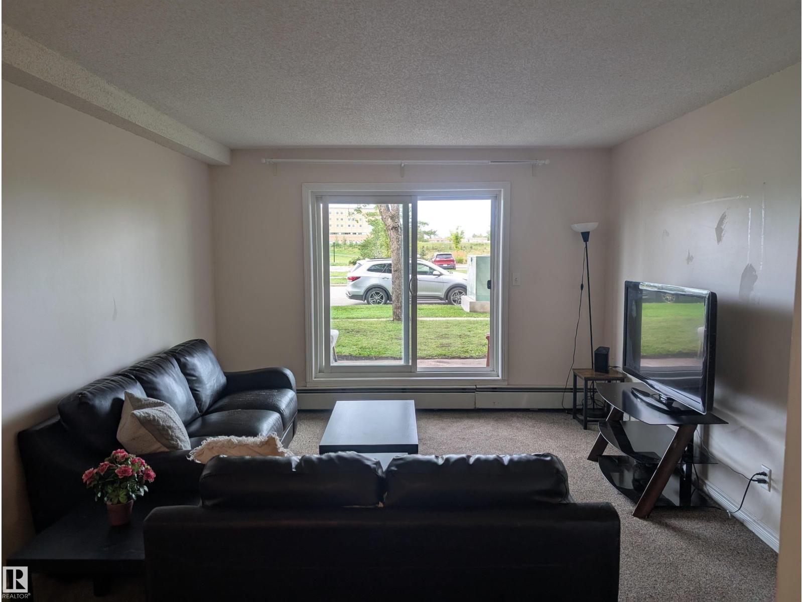 #110 5065 31 AV NW NW