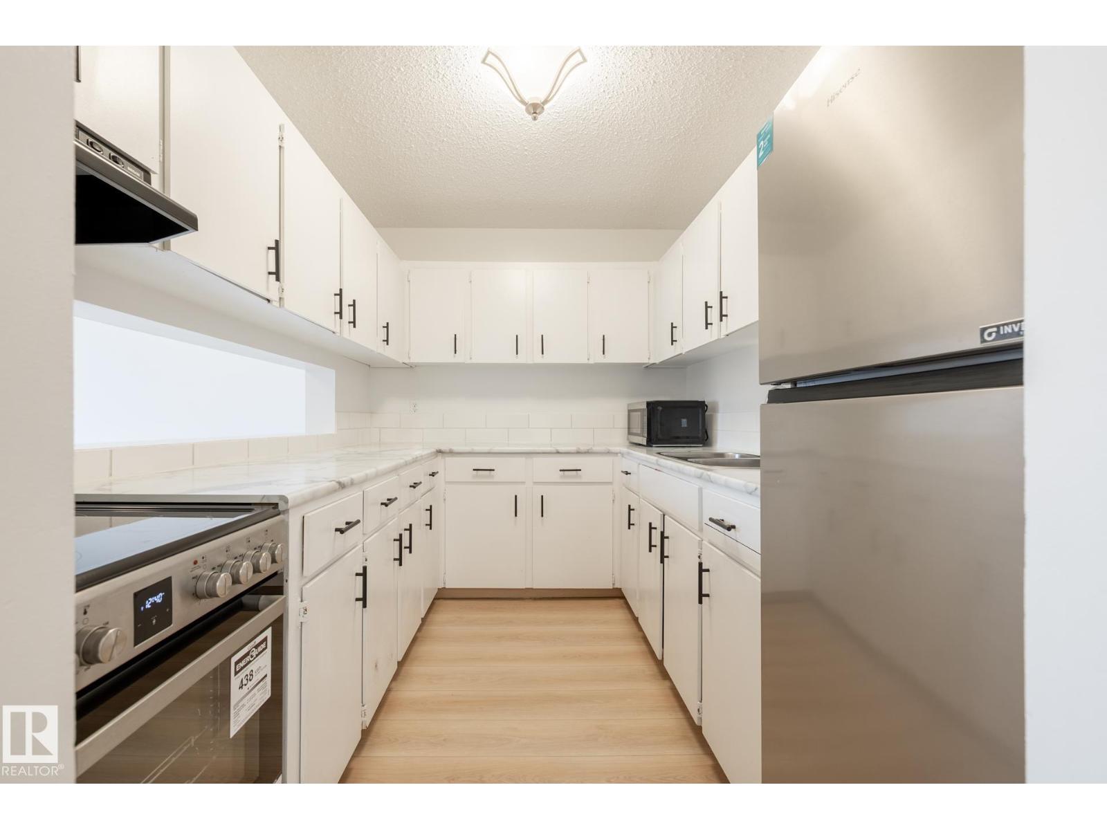 #303 10620 104 ST NW