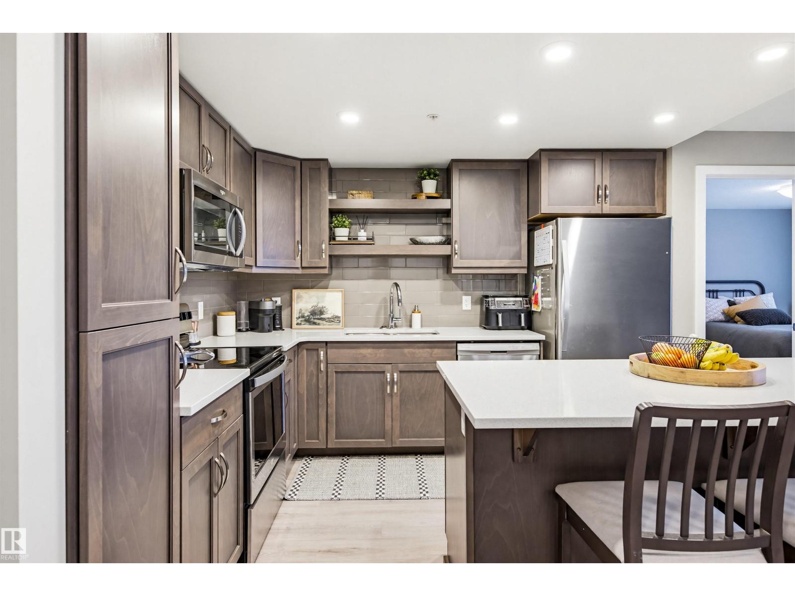 #232 5504 SCHONSEE DR NW