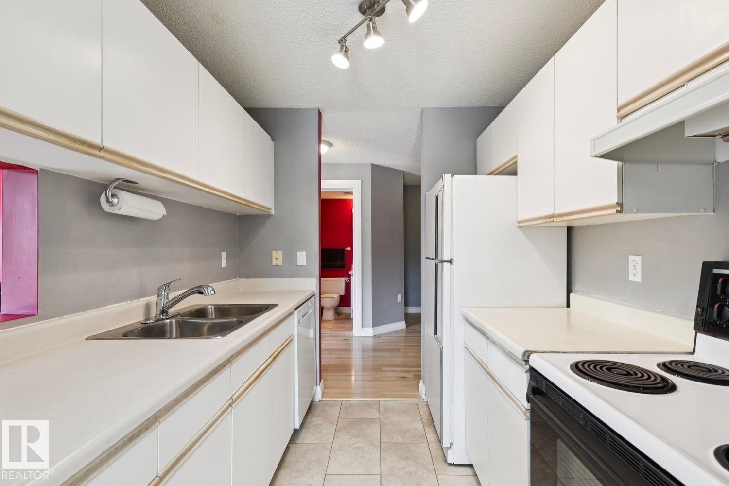 #239 10636 120 ST NW