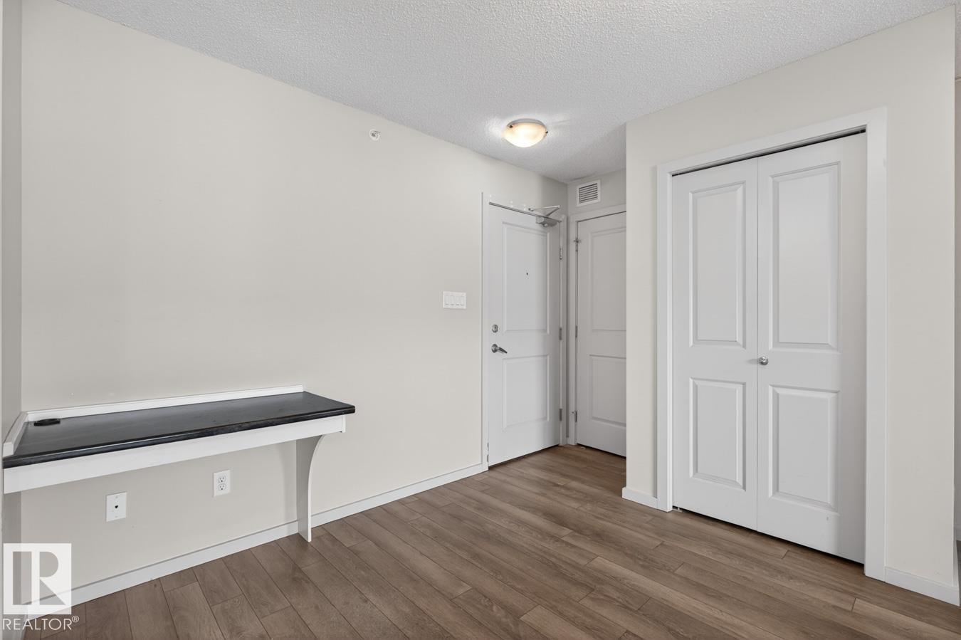 #426 390 WINDERMERE RD NW