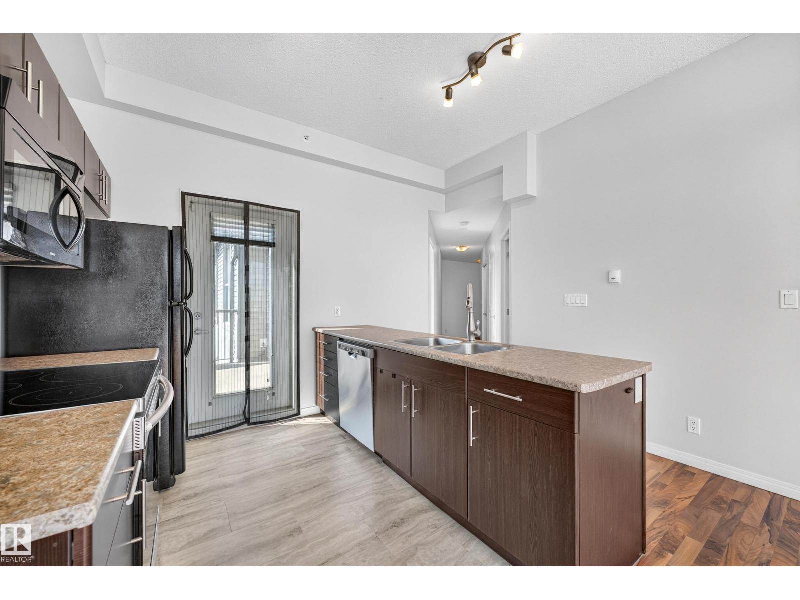 #406 105 AMBLESIDE DR SW