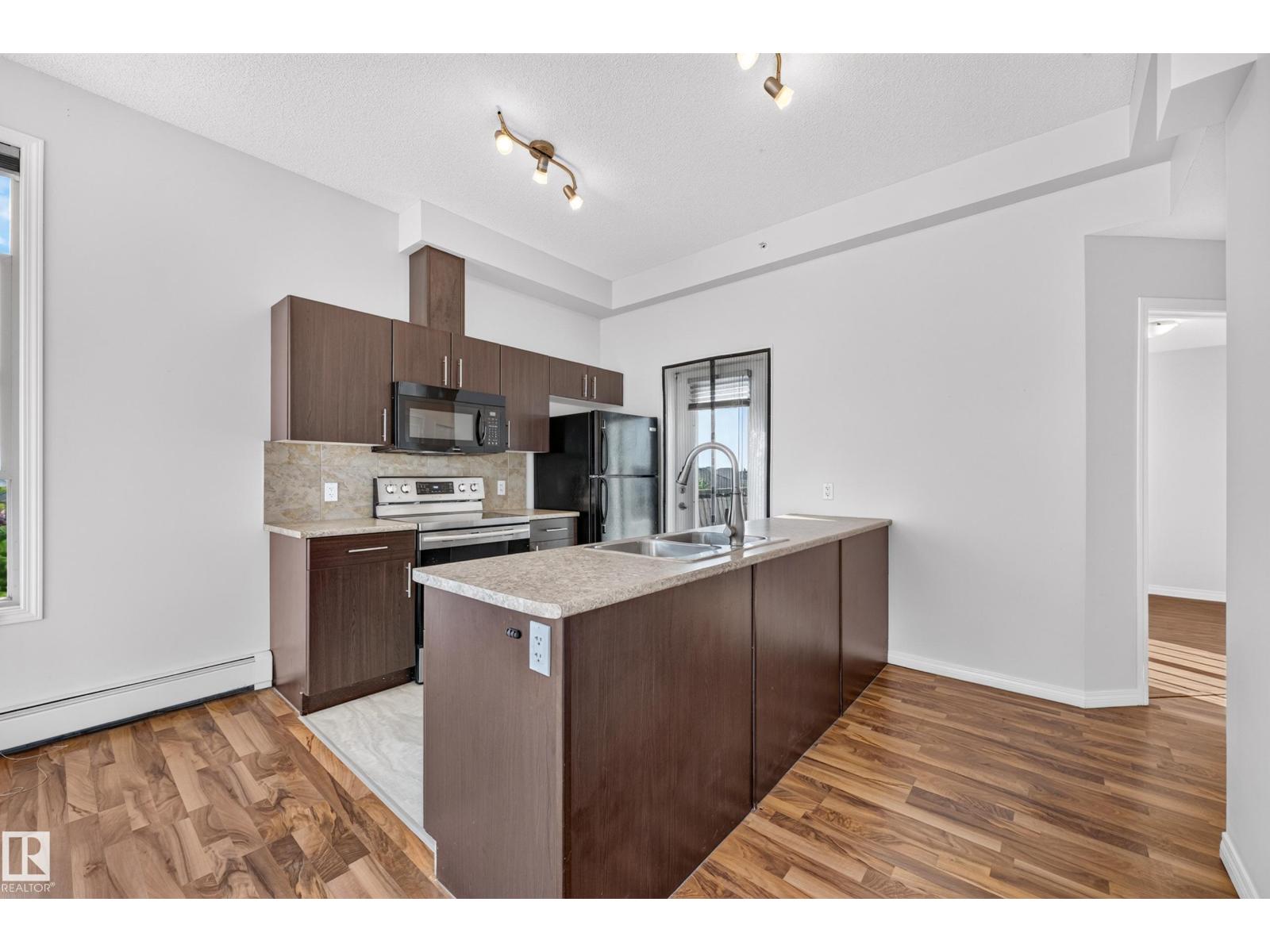 #406 105 AMBLESIDE DR SW