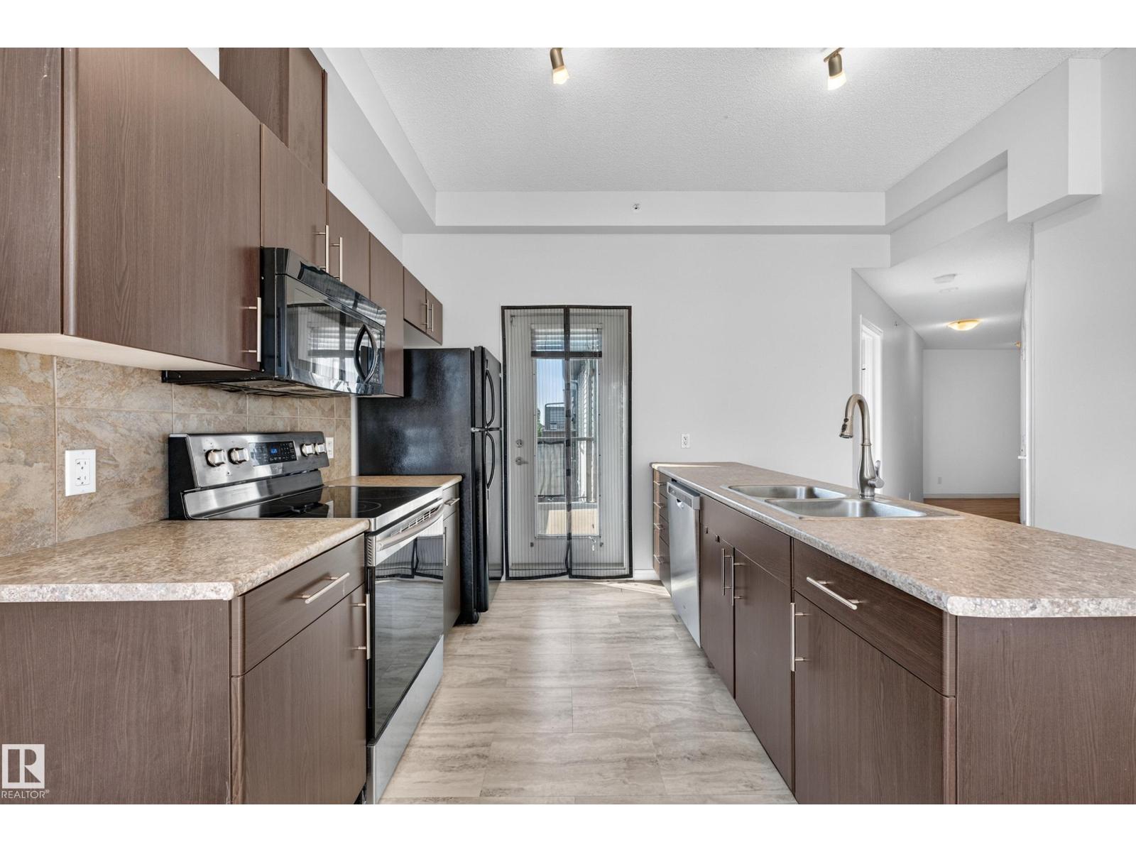 #406 105 AMBLESIDE DR SW