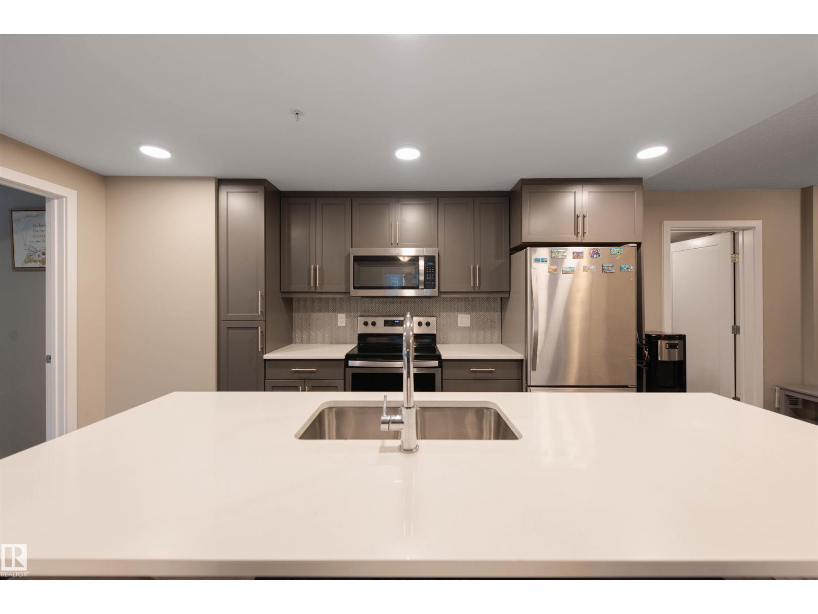 #121 5504 SCHONSEE DR NW