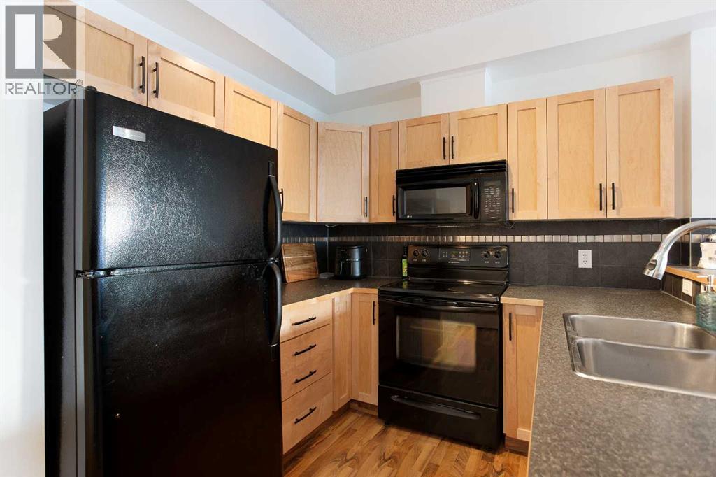 1116, 211 Aspen Stone Boulevard SW