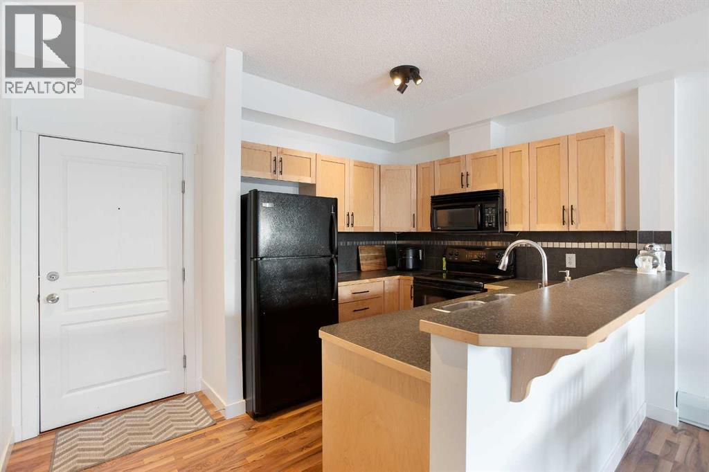 1116, 211 Aspen Stone Boulevard SW