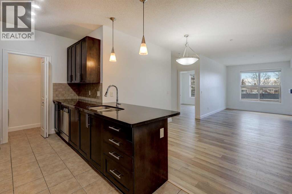 103, 88 Arbour Lake Road NW