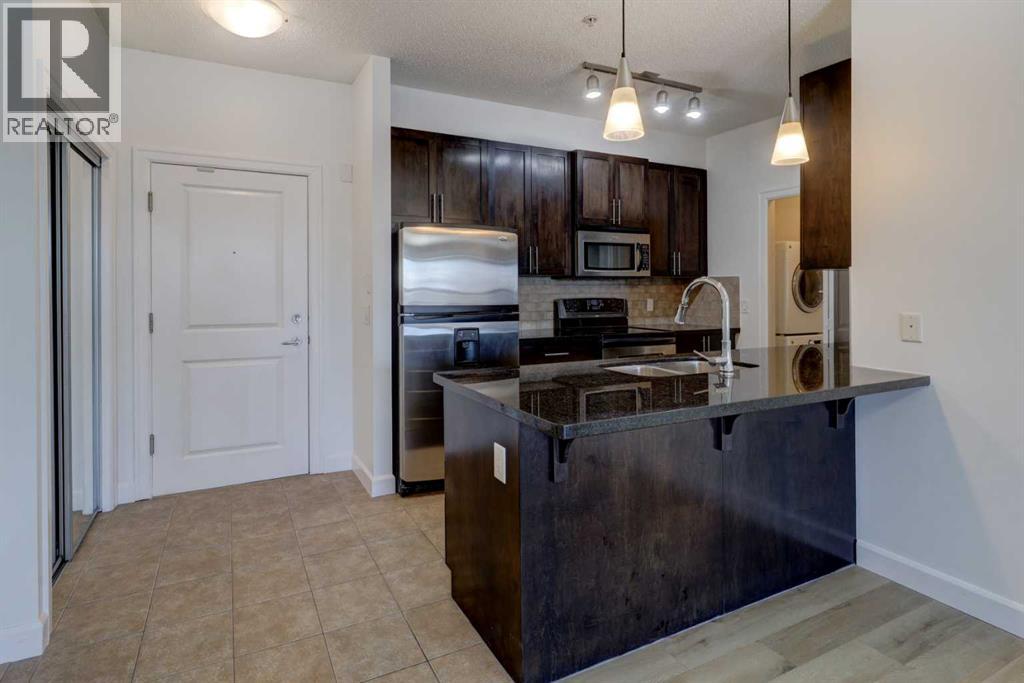 103, 88 Arbour Lake Road NW