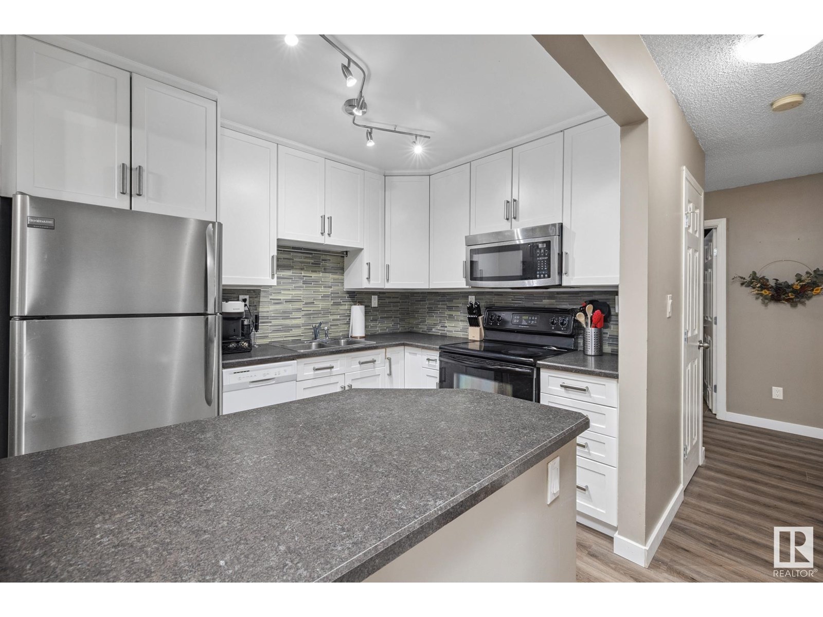 #310 1624 48 ST NW