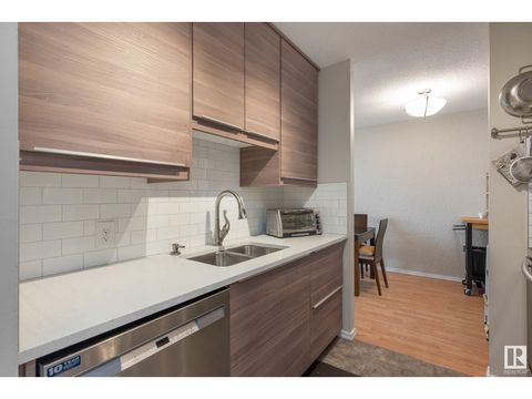 #810 11307 99 AV NW Edmonton AB T5K0H2