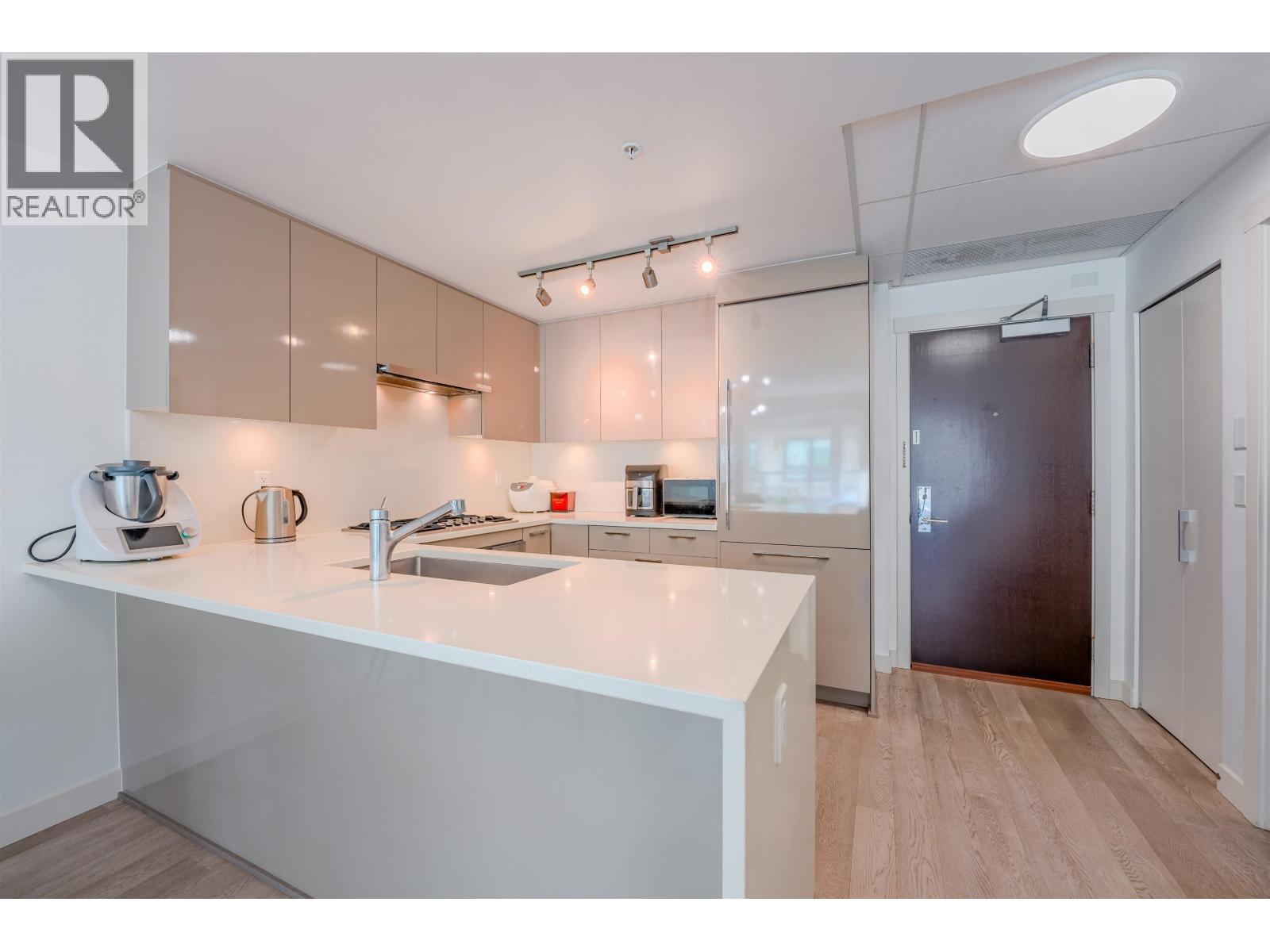 208 4408 CAMBIE STREET