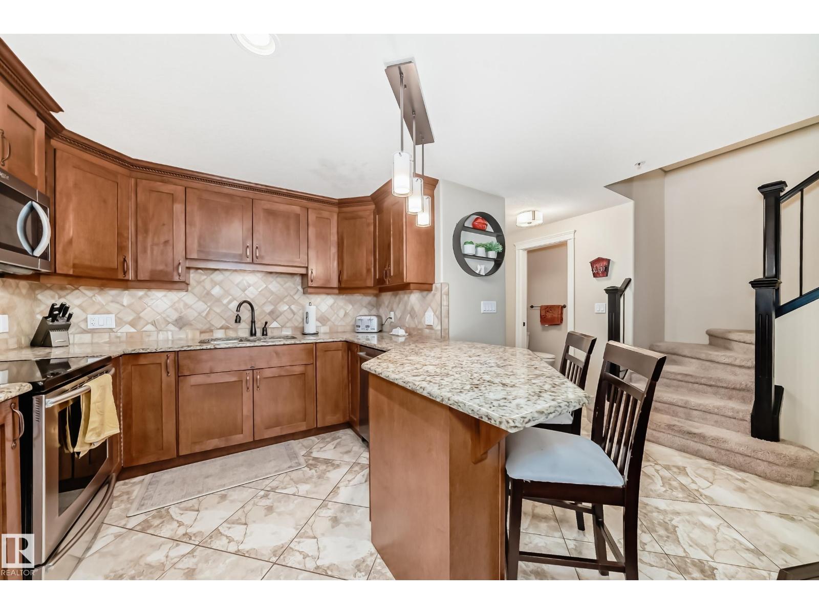 #225 10142 111 ST NW