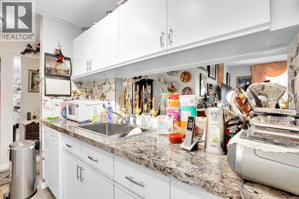 203, 21 Dover Point SE