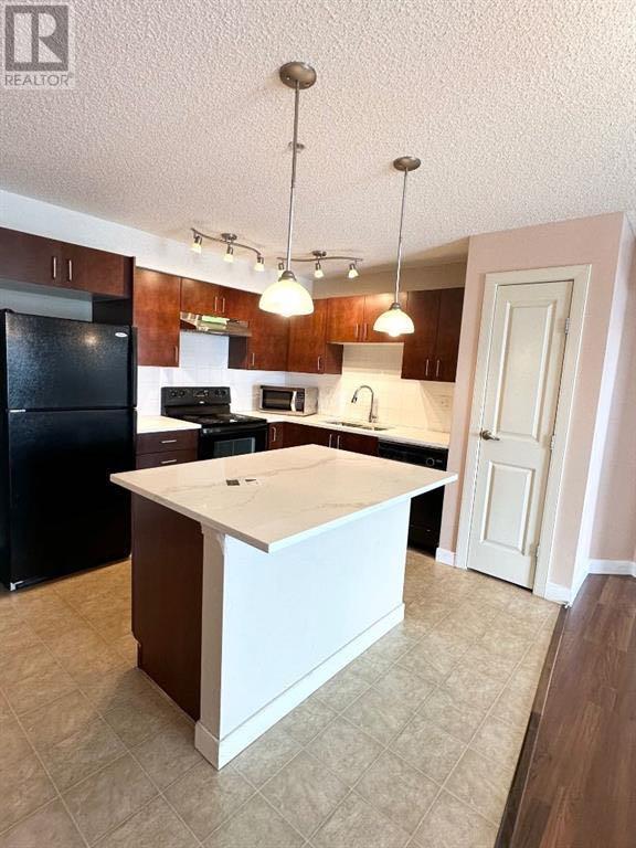 309, 108 Country Village Circle NE