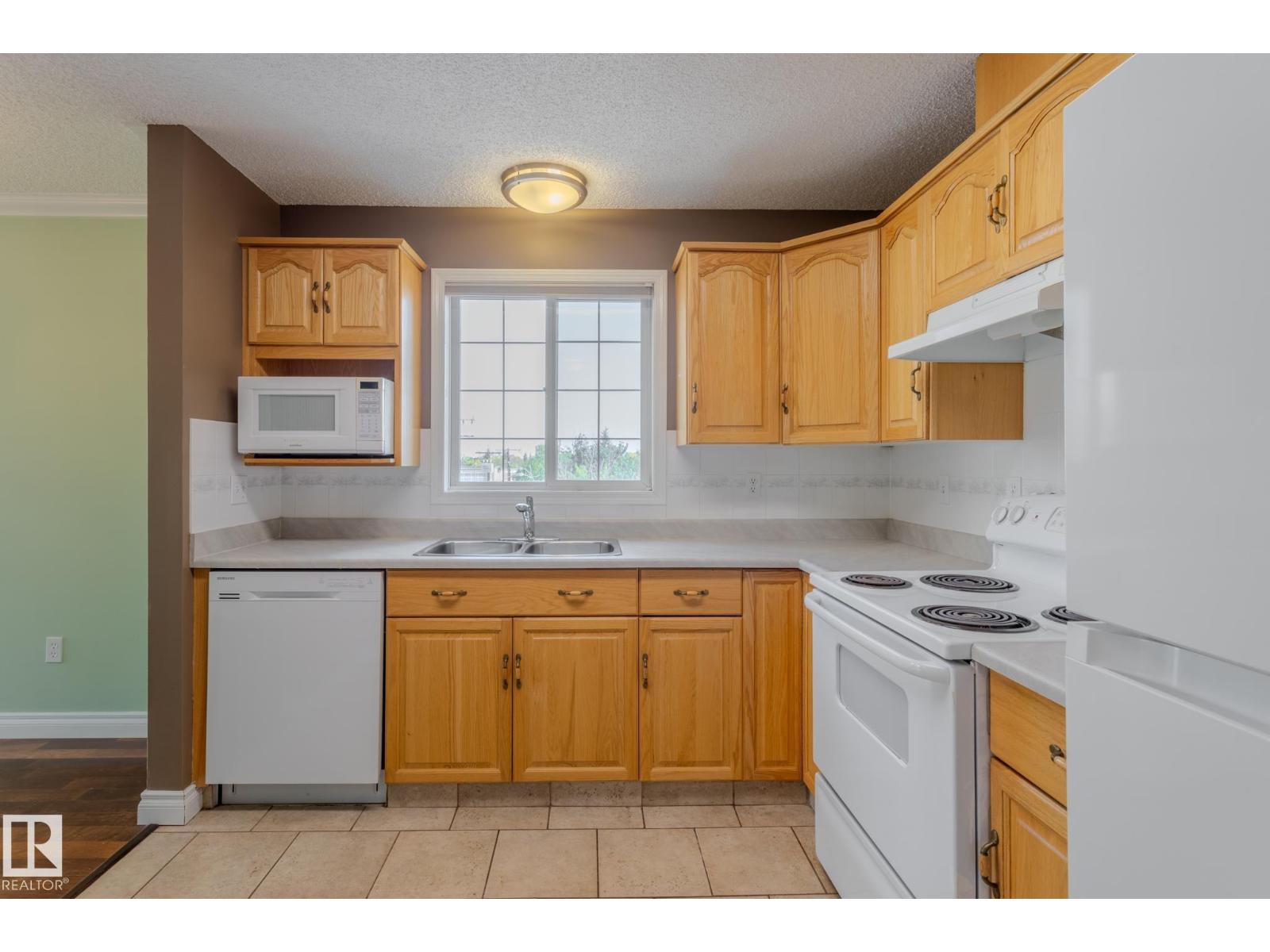 #305 13450 114 AV NW