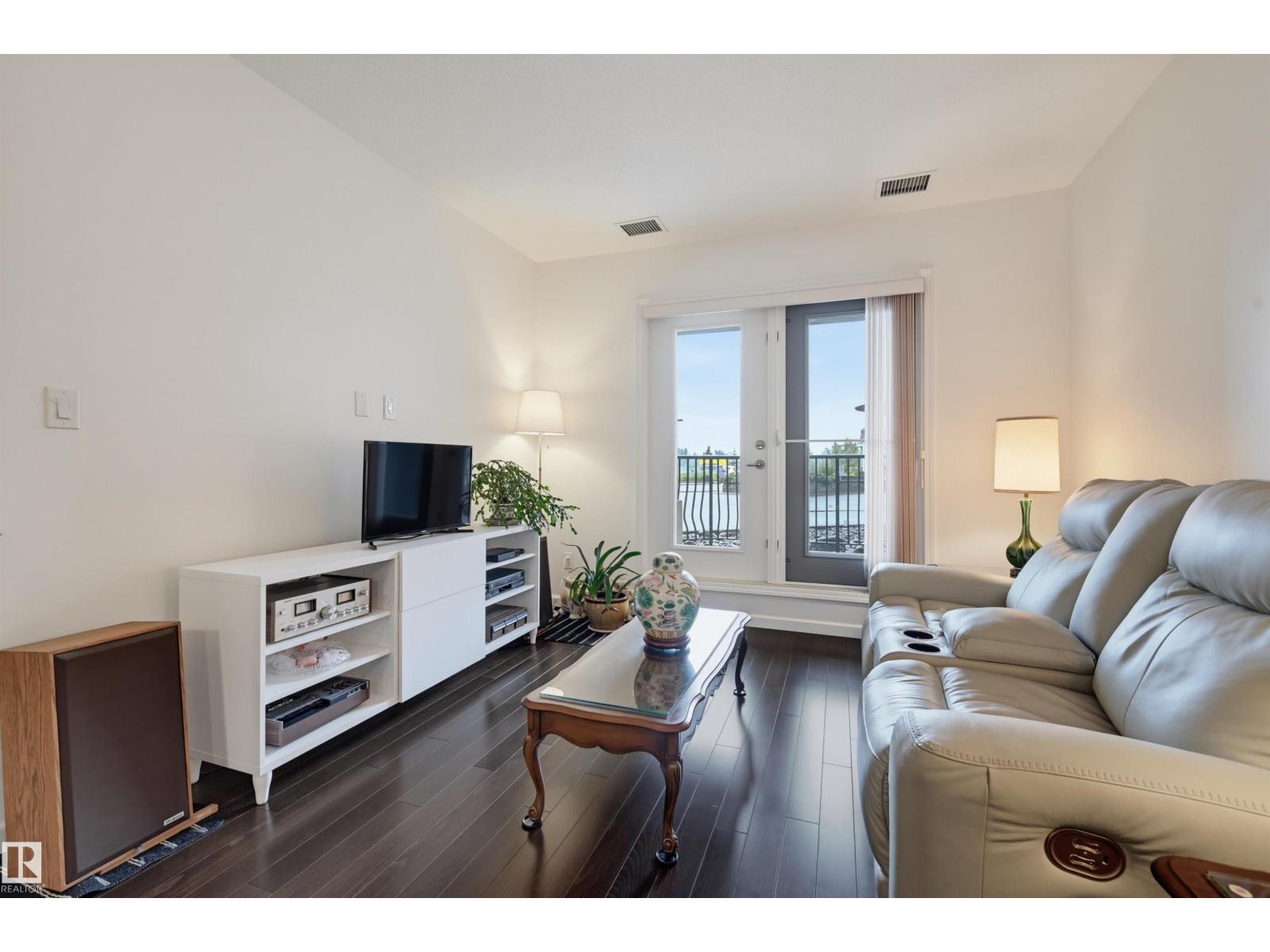 #110 6083 MAYNARD WY NW