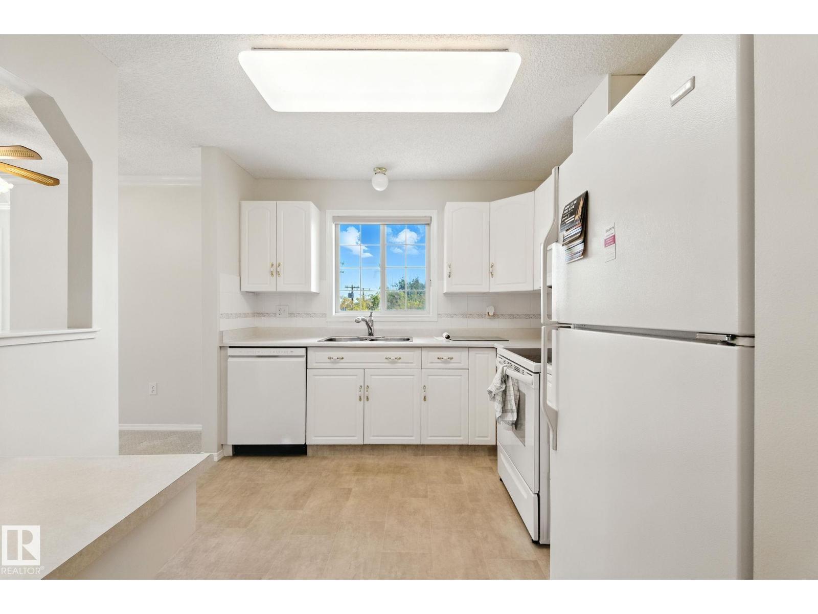 #205 13450 114 AV NW