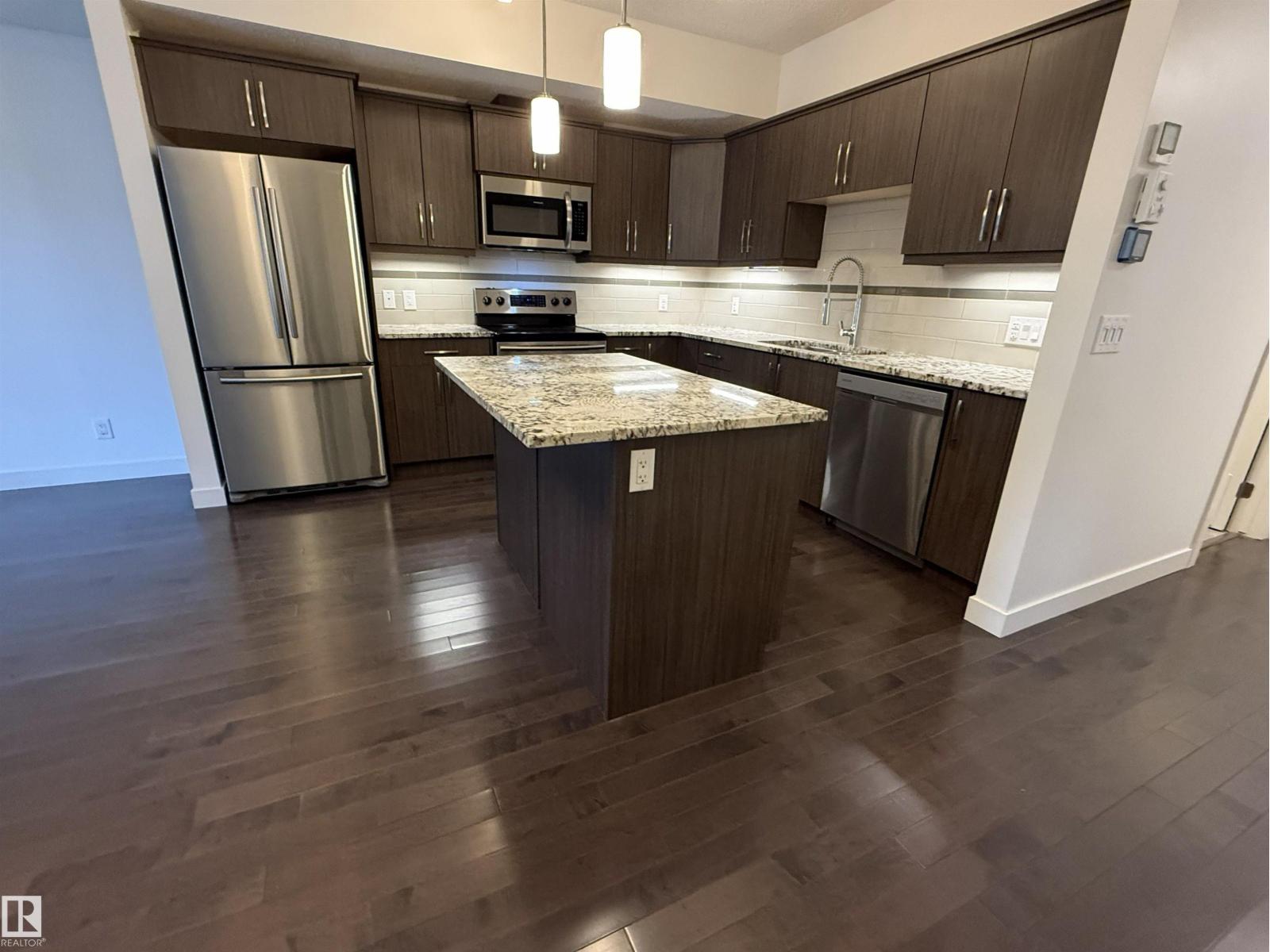 #119 10523 123 ST NW