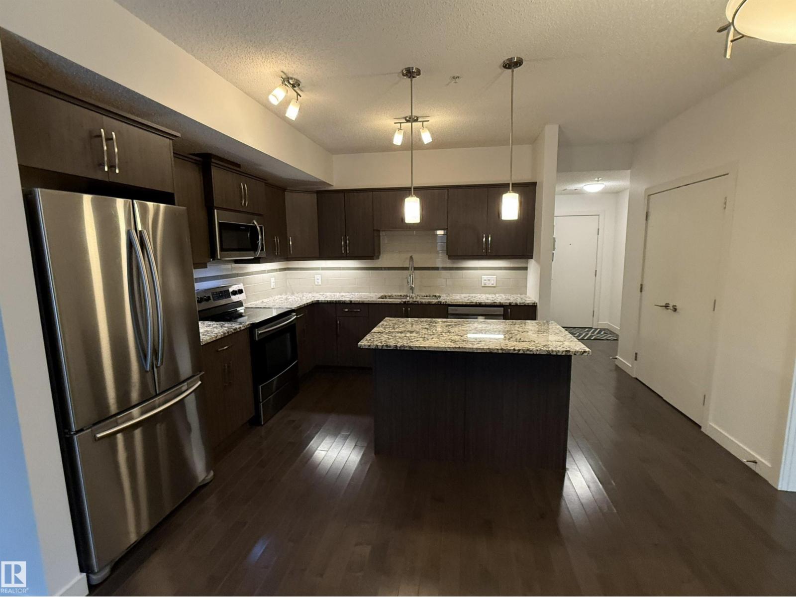 #119 10523 123 ST NW